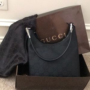 Black Gucci purse only used twice.